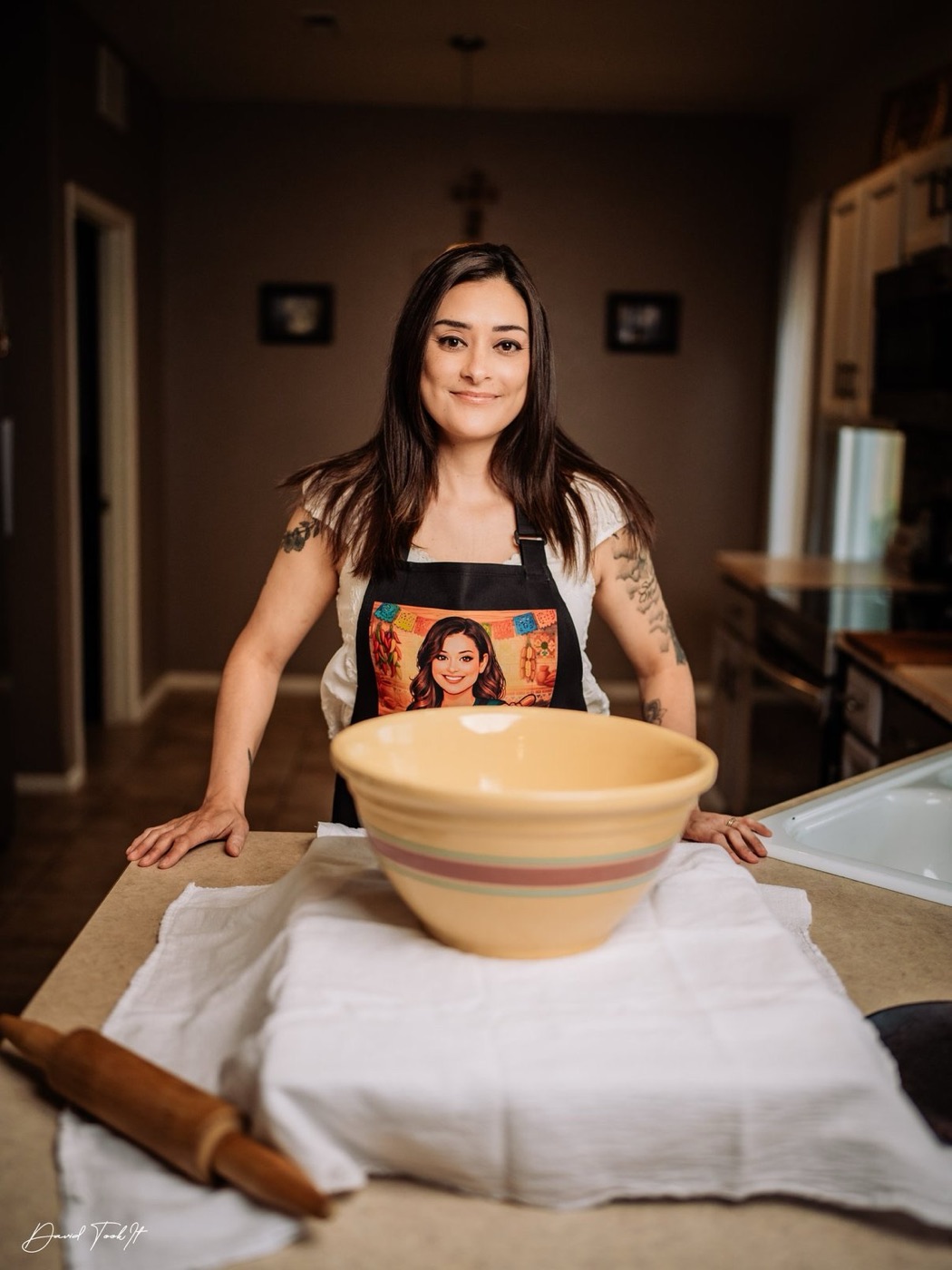 Lynnea making tortillas in her kitchen