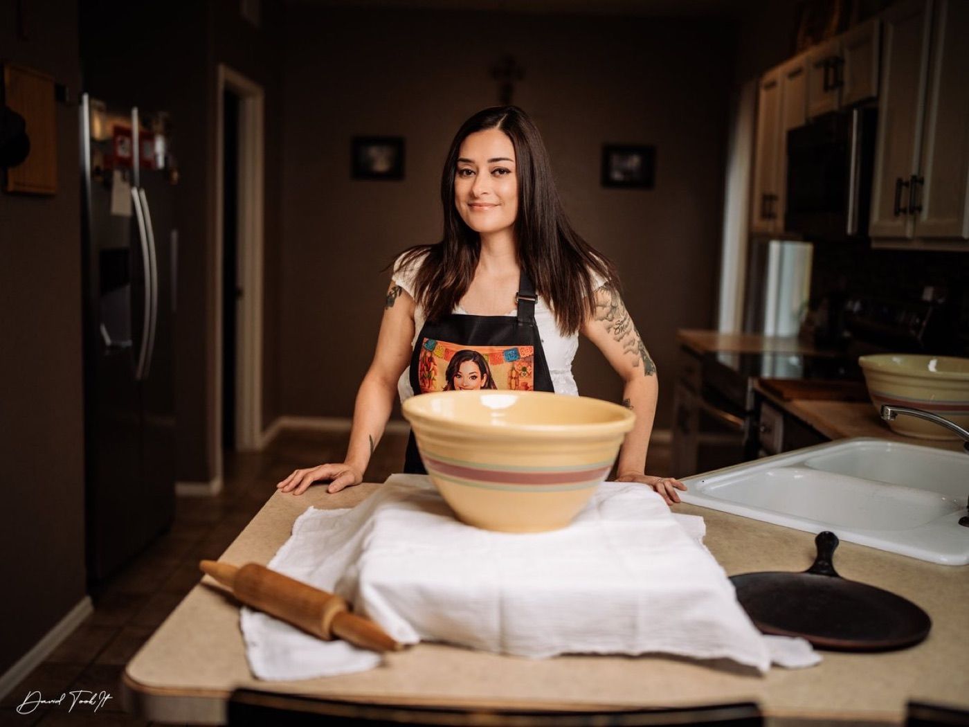 Lynnea making tortillas by hand in her kitchen